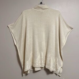 Charming Charlie turtleneck poncho lace bottom cream with‎ sparkly gold all over